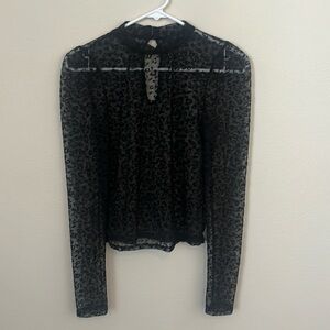 Black sheer, mock turtle neck, leopard print crop top.  Size small